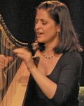 miairishartscenter2007 Mia singing and playing Celtic harp at the Irish Arts Center